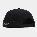 Détail du bonnet docker noir en coton avec broderie Asher et boucle de réglage en métal - Réglable / Noir