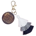 Detail of wooden MAMA keychain with tricolor tassel and gold lobster clasp on white background - White, Grey and Black