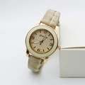 Elegant rose gold quartz watch with beige embossed leather strap on white display - Yellow