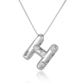 Macro shot of silver letter H pendant with micro-paved zircons on a classic box chain - Letter H
