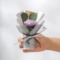 Handcrafted knitted purple flower bouquet with eucalyptus leaves in starry mesh wrap - Knitted Purple Rose