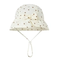 Detail of baby cotton sun hat with brown polka dots, wavy brim, and adjustable strap - Khaki Polka Dot