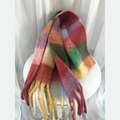 Winter plaid scarf with colorful tie-dye patterns and soft fringe tassels on a table - Multicolor Patchwork Plaid (11)