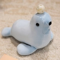 Soft light blue plush seal toy with a white hollow ball on a cozy beige carpet - Blue Seal Lion / 25cm