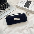 Polka dot stationery pouch on desk with laptop and notebooks for study scene - Navy Blue