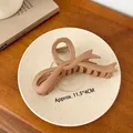 Matte nude pink ribbon bow hair claw clip in a large 11.5cm size for thick hair - 11.5cm x 4cm / Nude