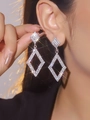Green rhinestone geometric rhombus drop earrings worn by a model in a luxury style - Silver Rhombus Long Style (DTE1316579S-W)