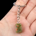 Handheld Unakite gemstone keychain with silver metal ring and green mottled rectangle stone - Unakite