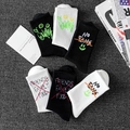 Graffiti style black and white athletic socks featuring sunny smiley and bold typography - One Size / Black And White Assorted (17-07-04-14-18-08)