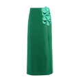 Detail of emerald green high-waist skirt featuring 3D floral accents and side slit design - Green Wrap Skirt