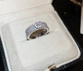 Luxury silver ring with pink zircon center and pavé crystals on black leather box - Round Pink Main Stone Style