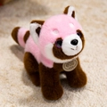 Pink and brown panda plush toy with purple glitter eyes and a TOY brand tag - Pink Red Panda