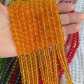Strand of polished translucent orange round beads for DIY jewelry and accessory making - Yellow Glass Beads