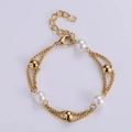 Double-layered gold titanium steel bracelet with natural pearls and golden spherical beads - Gold