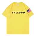 Bright yellow Freedom slogan cotton t-shirt with US flag print on the sleeve - S / Yellow