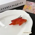 Funny realistic chicken feet hair clip in orange-red resin with silver metal slide - Braised Chicken Feet