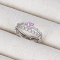 Detail of pink heart-shaped zirconia ring with silver band in a beige jewelry box - Pink Heart Hollow White Gold Style (Style 12 White Gold)