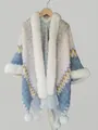 Close-up of wavy knit shawl with white faux fur collar and decorative pom-poms - Tops / White Purple