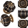 Retro black ceramic pumpkin cabinet knob with gold stripes and bronze base - Black Pumpkin Gold Line
