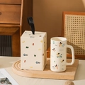 Cute ceramic puppy mug in cream white with a matching gift box and ribbon handle - Skateboard