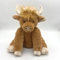 Close-up of brown Highland cow plush toy with realistic fur and pink floral headband - Movable Joints / With Flower / Brown