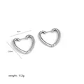 Macro detail of heart-shaped twist earrings with pave zircon and silver polished finish - Silver Large Heart Full Rhinestone Style (A0216H)