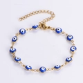 18K vergoldetes Edelstahl-Armband mit Evil Eye Perlen und verstellbarer Goldkette - Armband / Blau