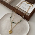 Double-layered golden necklace with green beads and a blue stone heart pendant - Sapphire Heart Pendant Necklace (XL0323)