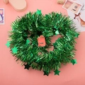 Dettaglio della ghirlanda a cuore verde metallizzato con paillettes a stella - 2 Metri Per Pezzo / Stella a Cinque Punte Verde