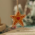 Gingerbread star resin ornament with white icing and red heart decoration, 6cm tall - Heart Star Style