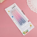 Pack of 6 pink and blue gradient pencil birthday candles with holders and festive packaging - Pink Blue Gradient