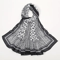 Detail showing checkered print and leaf pattern on thin breathable chiffon scarf - 180*70cm / VS744-Black