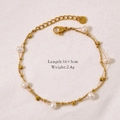 Dettaglio di bracciale con perle a doppio strato con chiusura a moschettone e s.steel - Bracciale di perle a doppio strato / Oro
