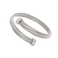 Macro shot of silver woven Tubogas bracelet with pavé rhinestones on the open ends - 8mm Silver Cross Bangle
