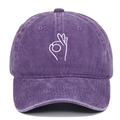Detailed close-up of OK gesture embroidery on washed purple cotton baseball cap - Adjustable / Purple