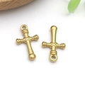 Detailed view of two polished gold cross pendants with engraved X patterns and top rings - Vintage X-Pattern Cross (T2411)