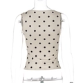 Detail view of cream sleeveless slim fit top with black polka dots and U-neck back design - XS / Khaki