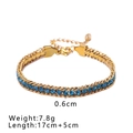 Golden stainless steel bracelet with row of blue cubic zirconia and adjustable chain - Gold Blue Zirconia Style (NB-B1130-13)