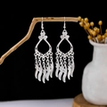Ethnic silver-style peacock earrings with hollow leaf design and feather tassels - Silver Hollow Feather Tassel(E5821)