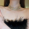 Close-up of sparkling multi-layered gold rhinestone choker necklace on a female model - 43# Necklace-Gold