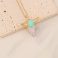Detailed close-up of a bohemian bull head pendant with turquoise on a gold chain - Turquoise and Light Purple White Bull Head (6#)
