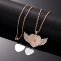 Detailed view of rose gold angel wing heart necklace with sublimation inserts and rhinestones - X459-8 Rose Gold Heart Wing (Twist Chain)