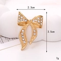 Golden bow brooch accessory with inlaid white crystals for DIY phone cases and shoes - D2478 23mm*35mm Gold Rhinestone Ribbon Bow