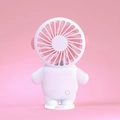 Portable pink astronaut mini fan with white base for desk and handheld use - Astronaut / Pink