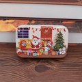 Christmas tin box with Santa Claus puzzle, wooden surface with warm holiday atmosphere - No. 1 Fireplace Style