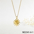 Close-up of golden sun pendant with spiral texture and dainty cross chain against white wall - Gold Sun Spiral