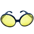 Detail of yellow round party glasses featuring a black hexagonal honeycomb lens pattern - Yellow Honeycomb Glasses