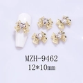 Detailed view of 12x10mm gold bow nail charms with heart crystal rhinestones - Gold Base White Heart (9462)