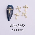 Vista macro di ciondoli a croce dorati per unghie con dimensioni 8x11mm per nail art DIY - Croce Lucida Oro (A268) / 8*11mm
