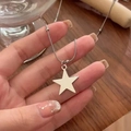 Silver star pendant necklace with snake chain and small bead accents on hand - Single Layer Pentagram Necklace